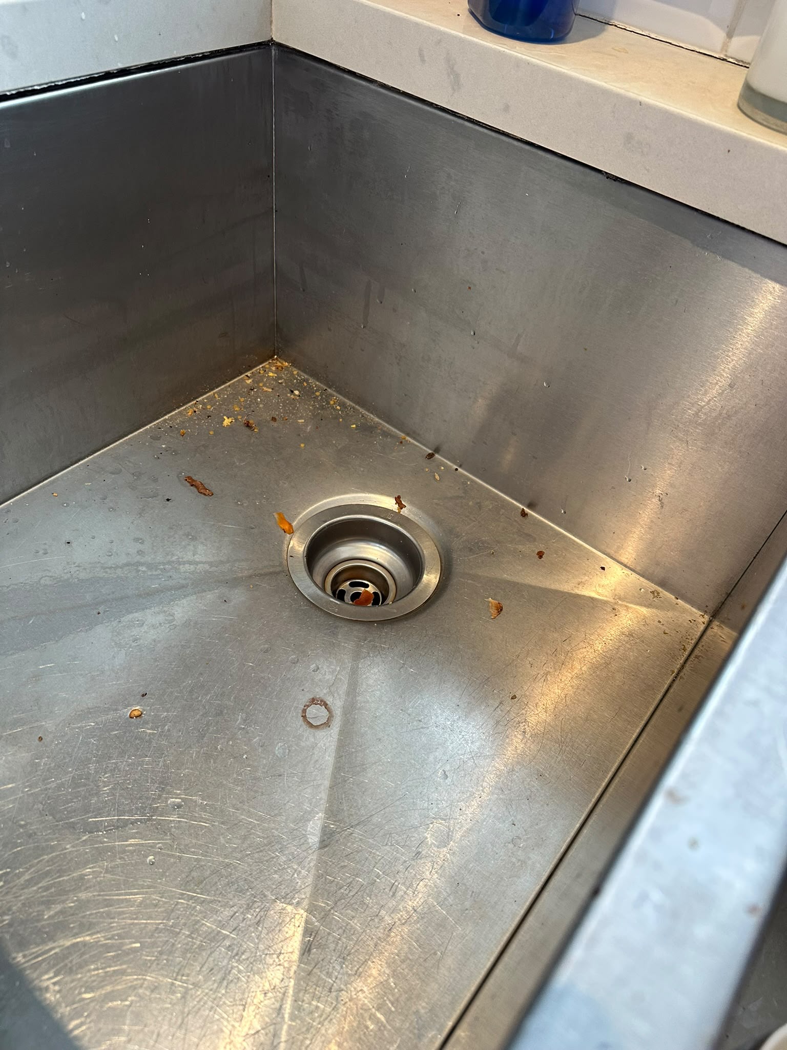 Stainless sink detail before cleaning