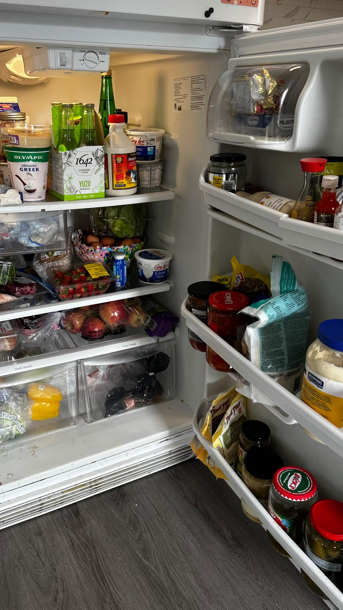 Fridge organization before cleaning